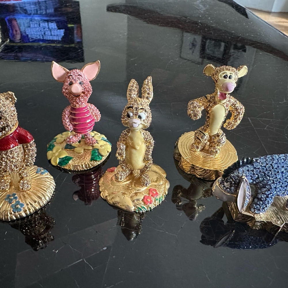 Limited edition Winnie the Pooh figurines made with Swarovski crystal